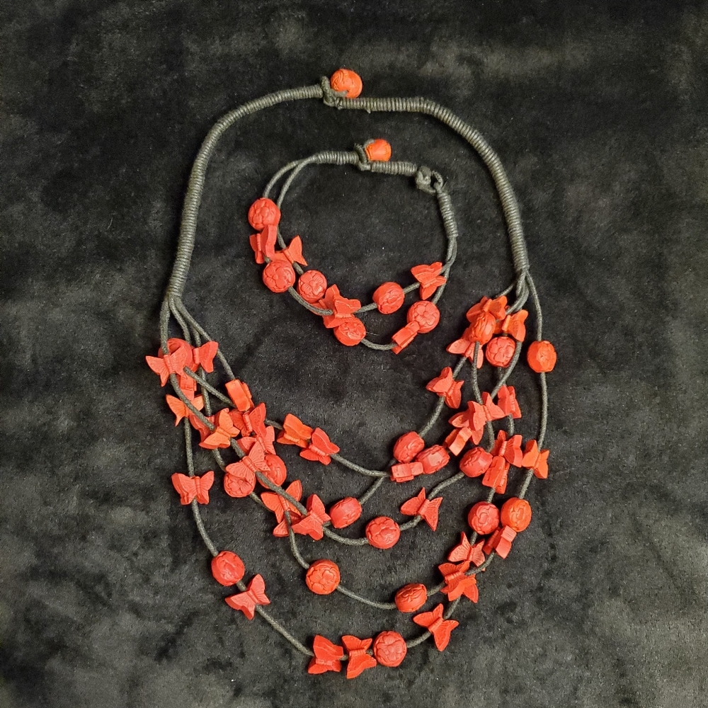Red butterfly beaded necklace and bracelet